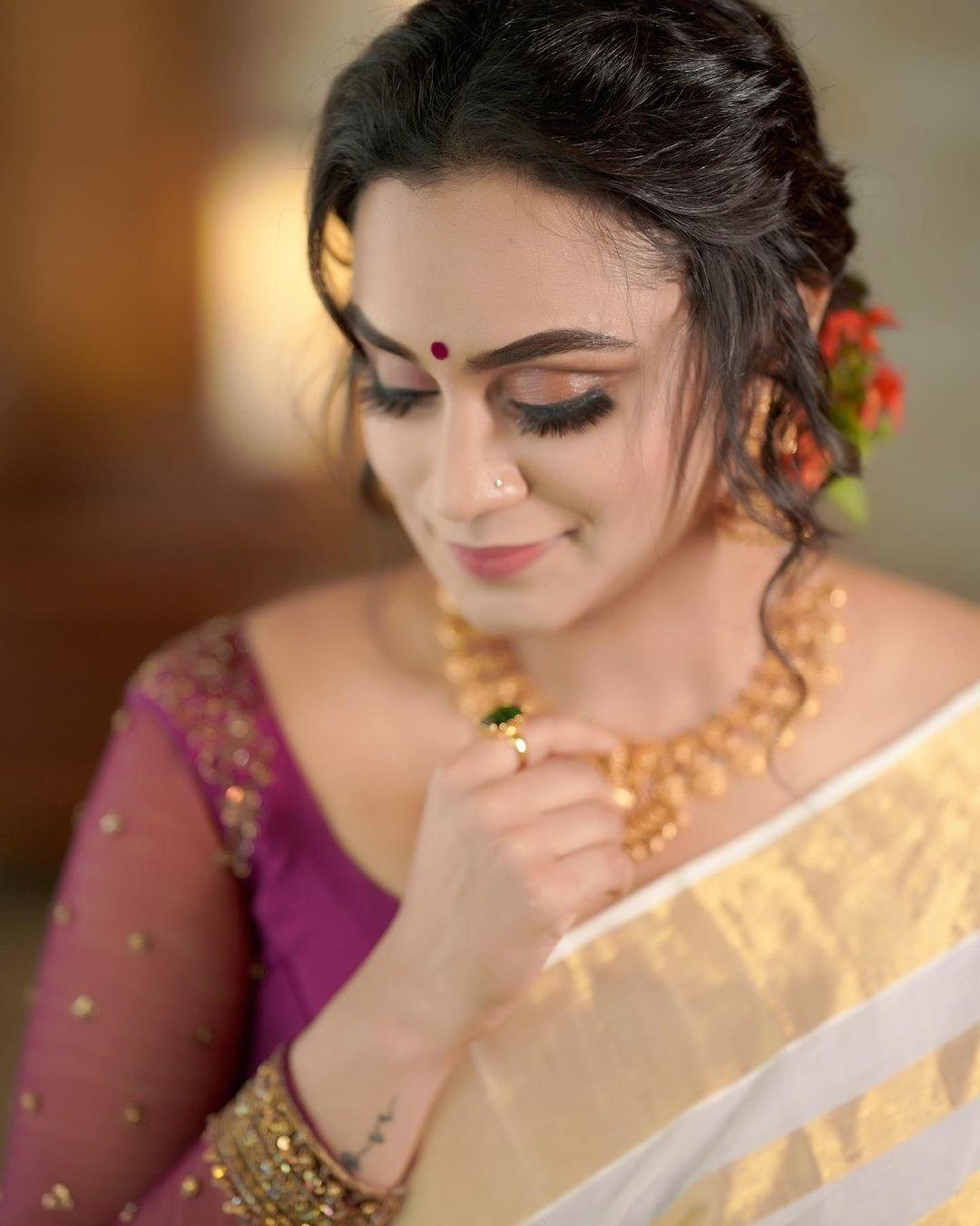 Beautiful and glamours photos | lakshmi nakshathra in set saree hot and sexy photoshoot