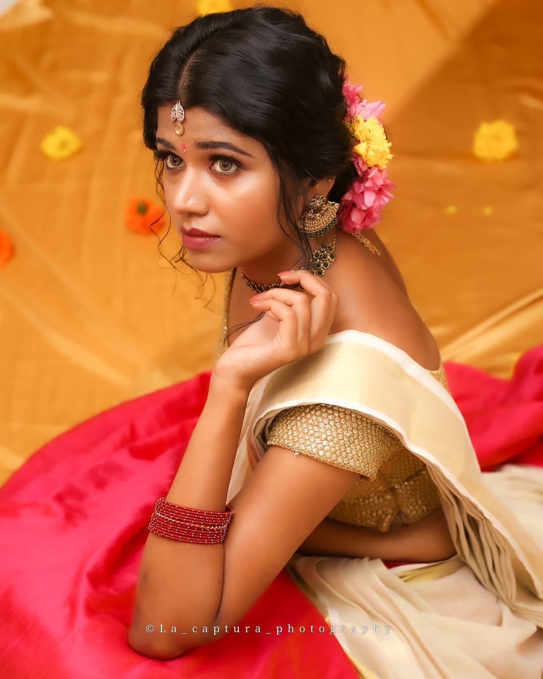 Very glamours and cute stills | Anju Krishna in half saree hot and sexy photoshoot