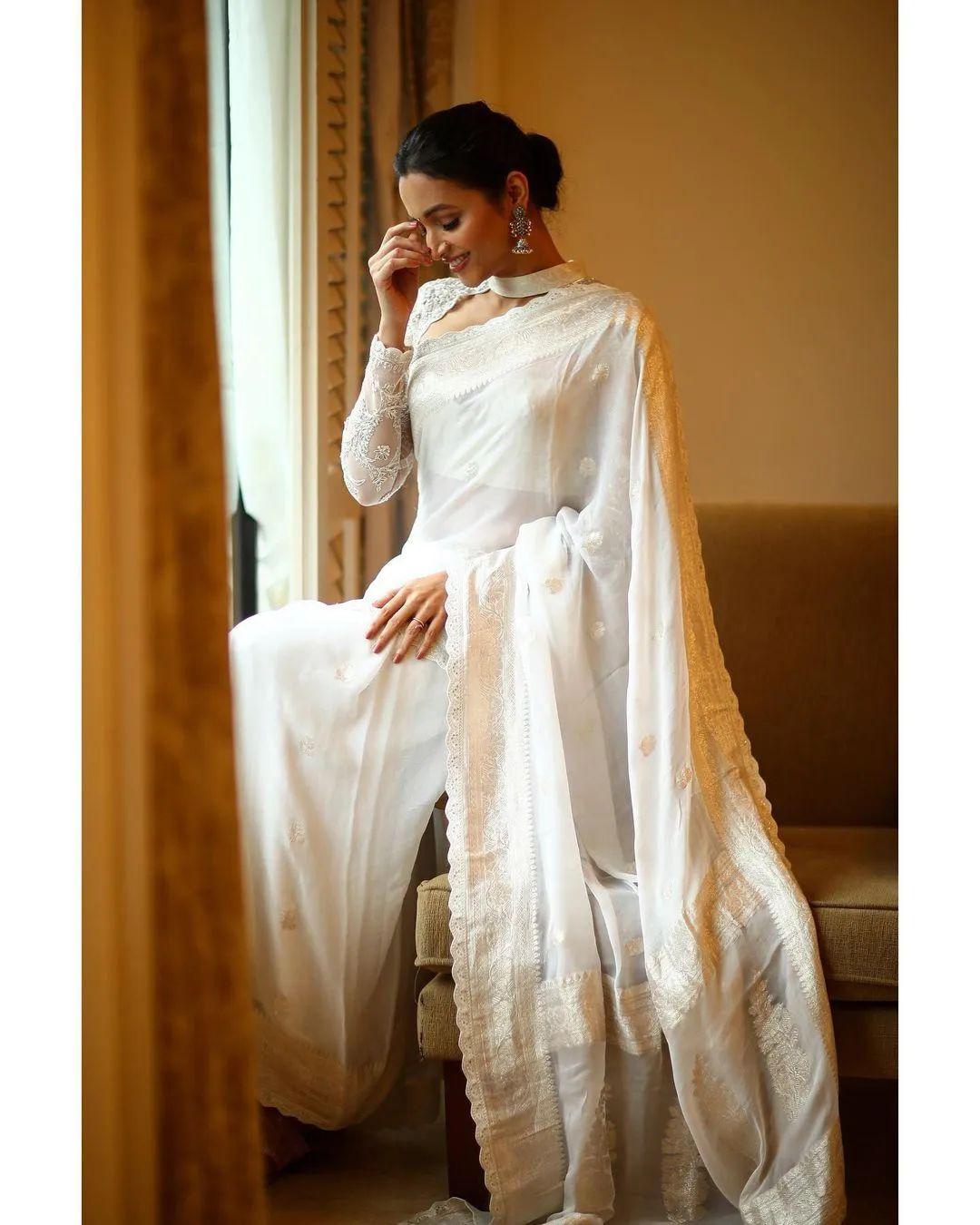 Glamorous and cute stills | Srinidhi Shetty in stylish and glamorous photos in white saree