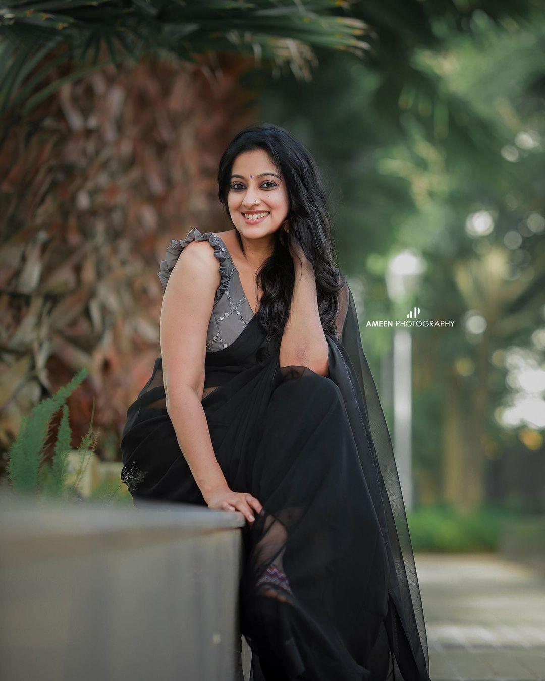 Hot and spicy photos |Laya Simpson in black transparent saree hot photos gallery
