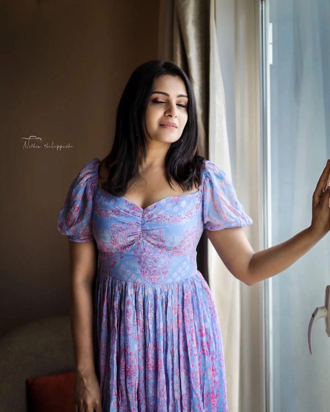 Looking very glamours photos | Divya Pillai exposing Cleavage and sexy photoshoot
