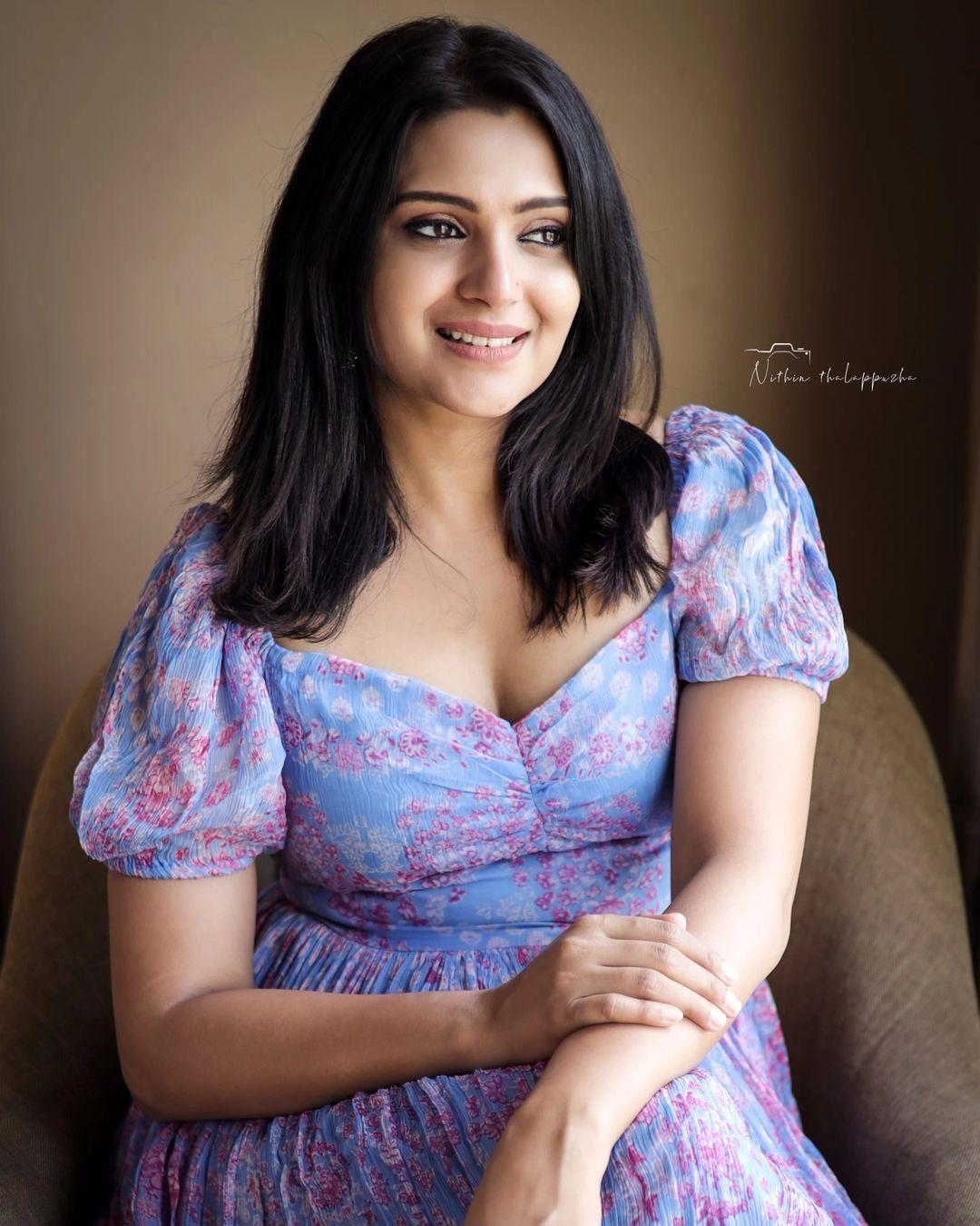 Unseen hot and spicy stills | Divya Pillai exposing Cleavage and sexy photoshoot