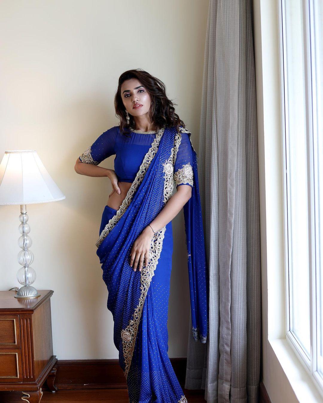 Glamours and cute stills | Akshara Gowda in blue saree hot and sexy photoshoot