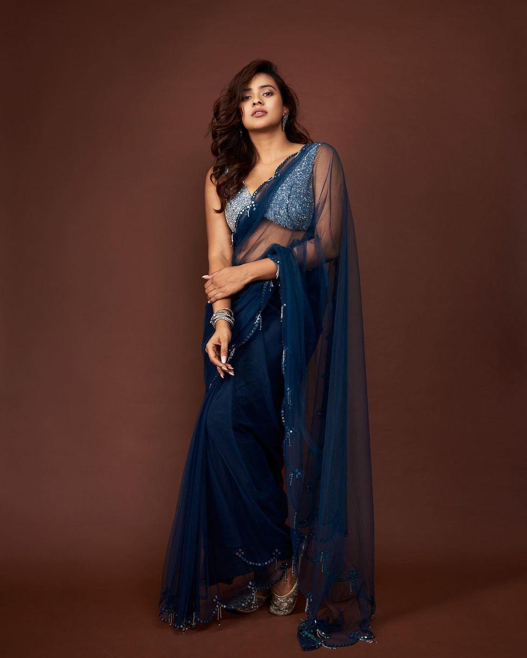 Hot and sexy photoshoot | Hebah Patel in blue transparent saree hot photos gallery