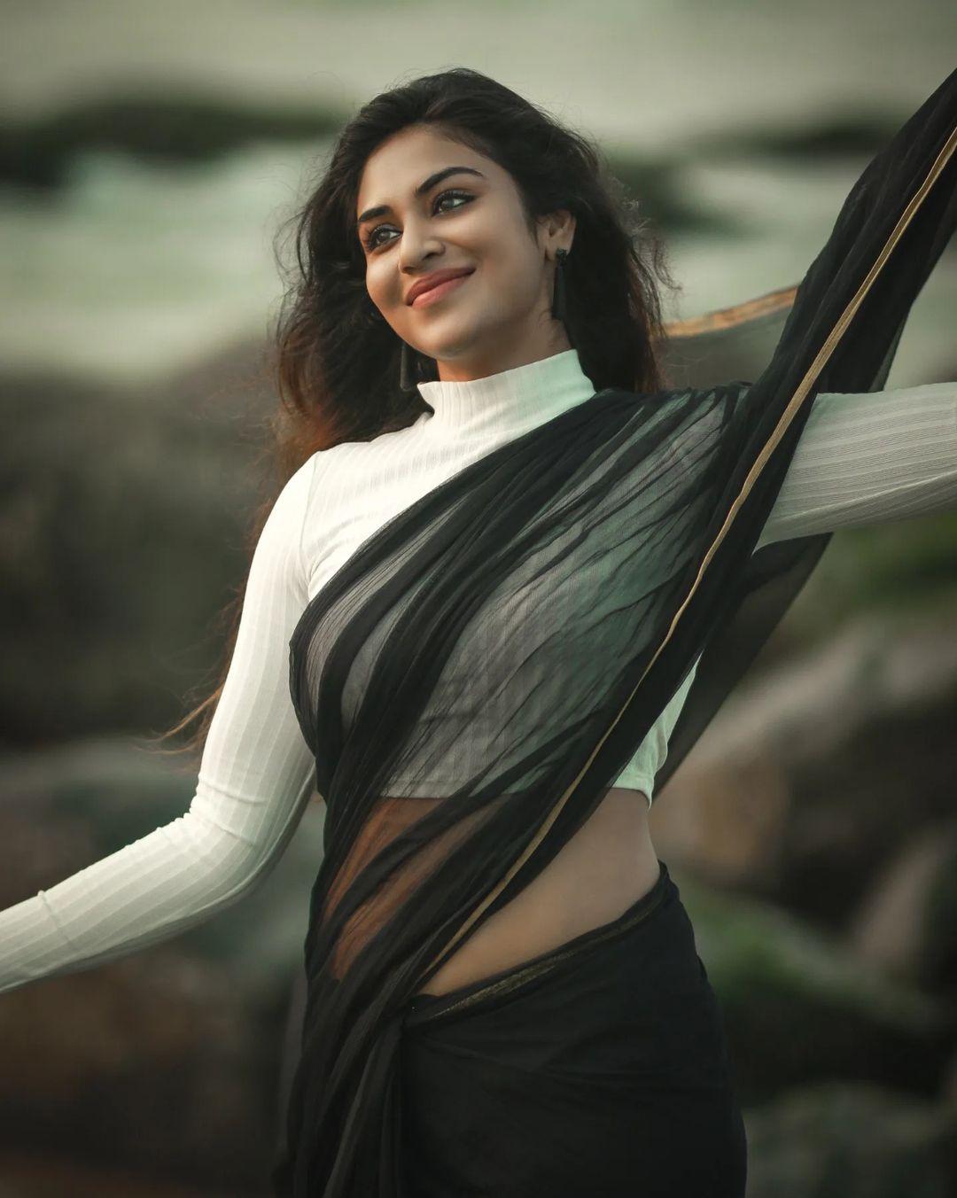 South Indian Actress hot photos | Indhuja Ravichandran wearing black Transparent saree hot photos