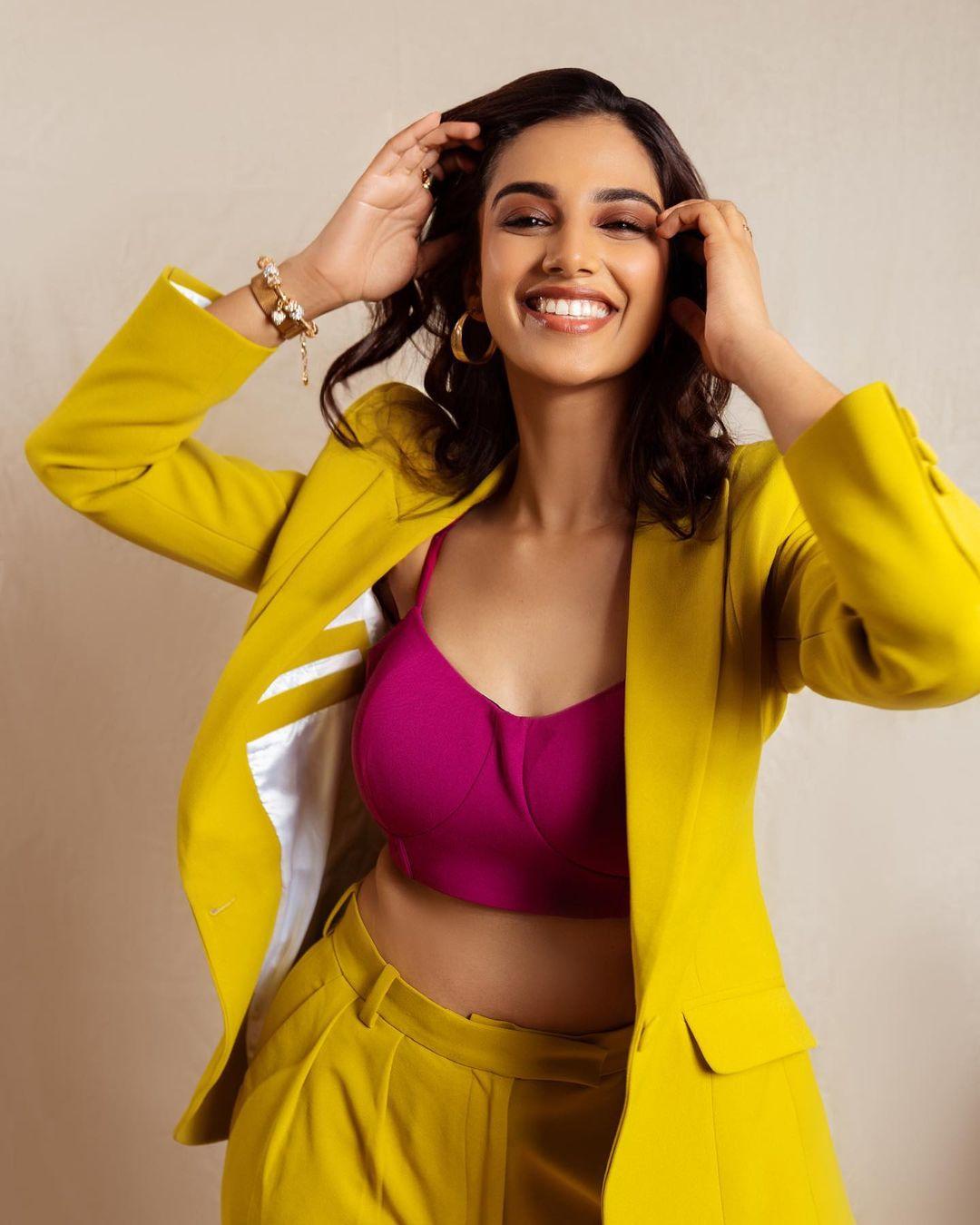 Glamorous and cute stills | Meenakshi Chaudhary very stylish photoshoot in yellow dress