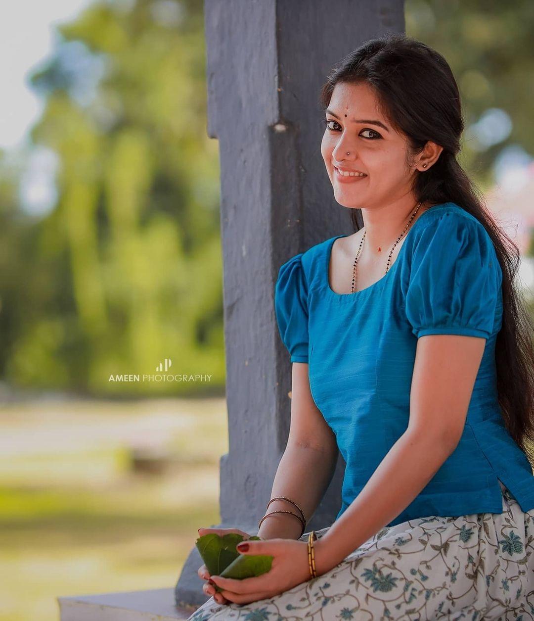 Beautiful and sexy photos | Aadhya Prasad in blue pavada and blouse hot photos