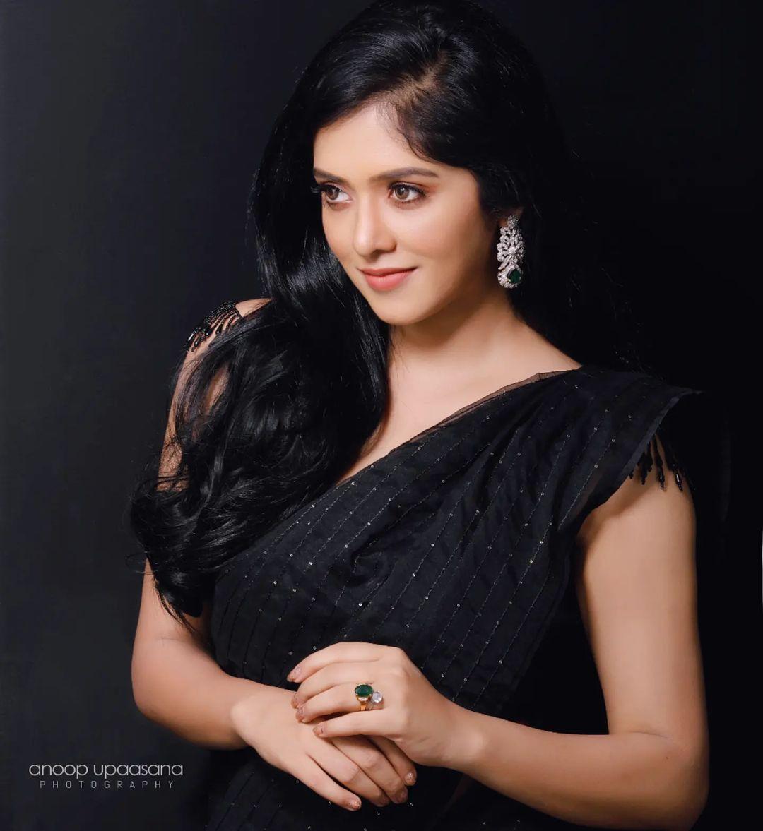 Beautiful and sexy stills | Aadhya Prasad in black Transparent saree hot and sexy stills