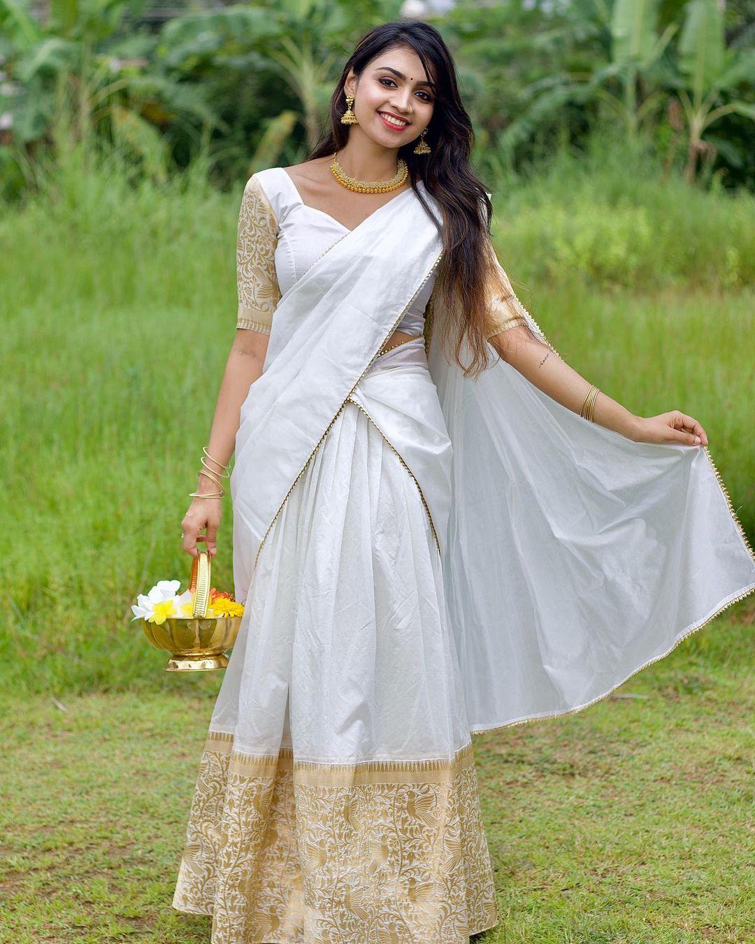 Cute and sexy photoshoot | Priyanka P Santhosh in Kasavu Saree very glamorous photos
