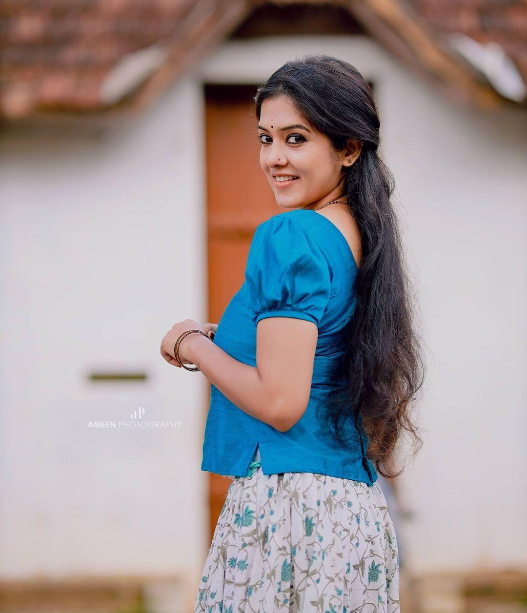 Exclusive hot photos gallery | Aadhya Prasad in blue pavada and blouse hot photos