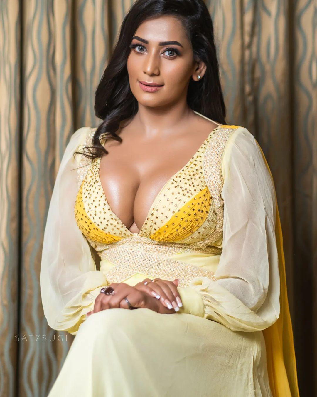 Glamorous and sexy photoshoot | Sanjana Singh popping out cleavage hot photos gallery