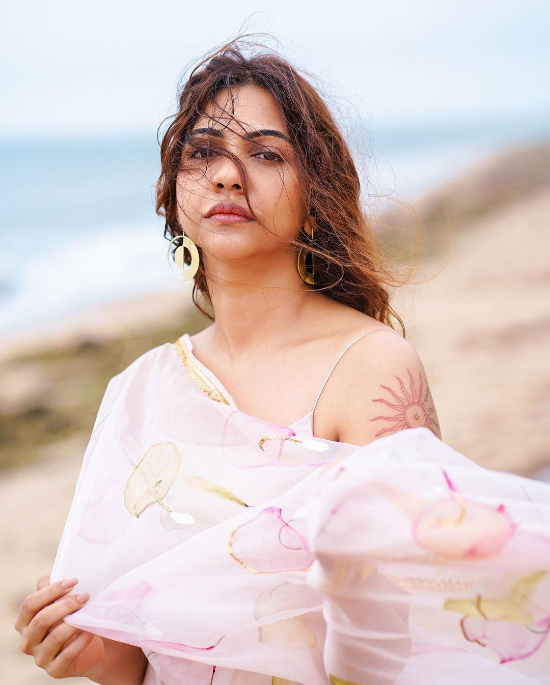 Beautiful and sexy stills | Madonna Sebastian very exclusive sleeveless dress hot and sexy photoshoot