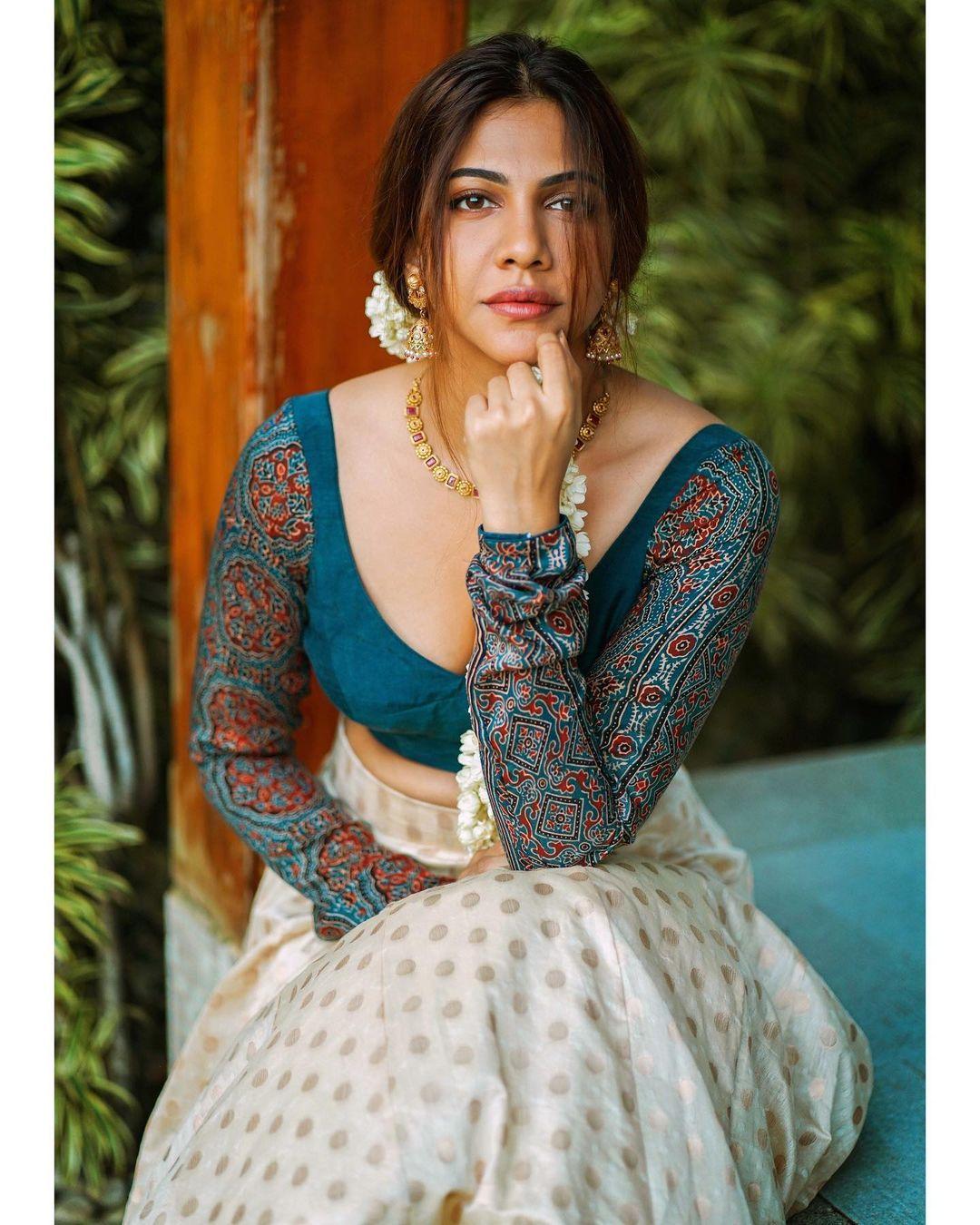 Exclusive hot and sexy photoshoot | Madonna Sebastian exposing Cleavage in pavada and blouse hot photos