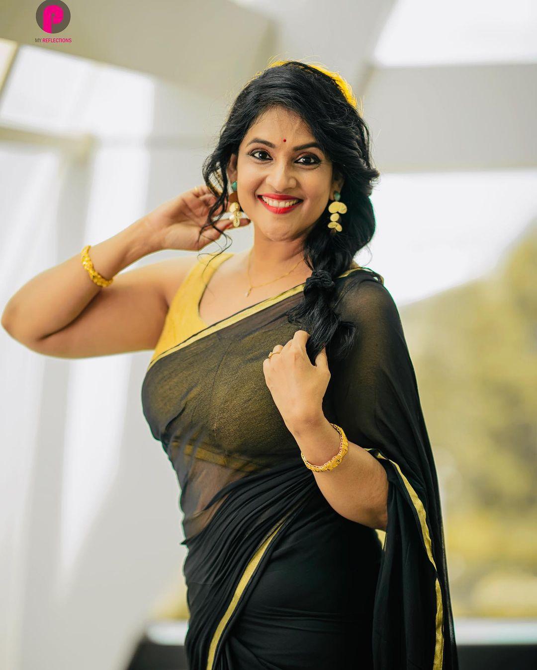 Glamorous And Cute Stills Gayatri Bhargavi Wearing Black Transparent Saree  Hot Photos Gallerysexiezpix Web Porn