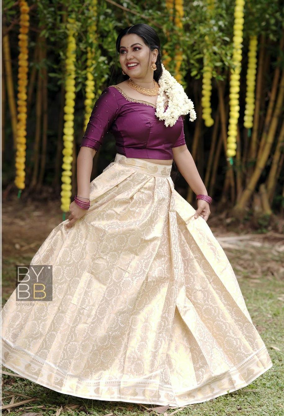 Glamorous and cute picture | Sruthy Suresh in pavada and blouse looking very sexy photos