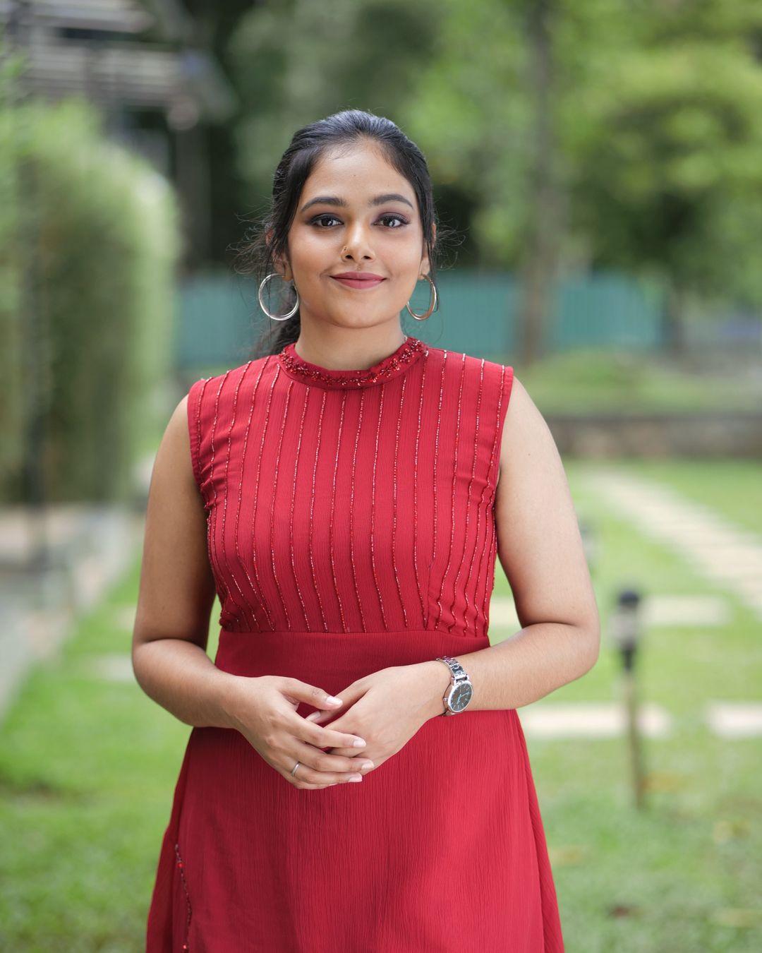 Beautiful and sexy stills | Rebecca Santhosh looking very attractive and cute stills in Red dress