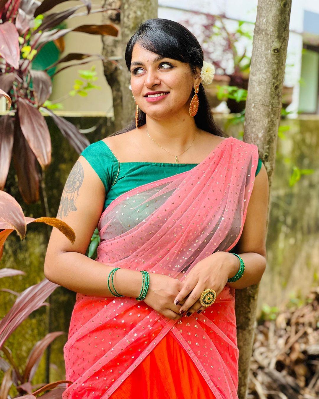 Beautiful and sexy stills | Rini Raj in transparent saree hot and sexy photoshoot