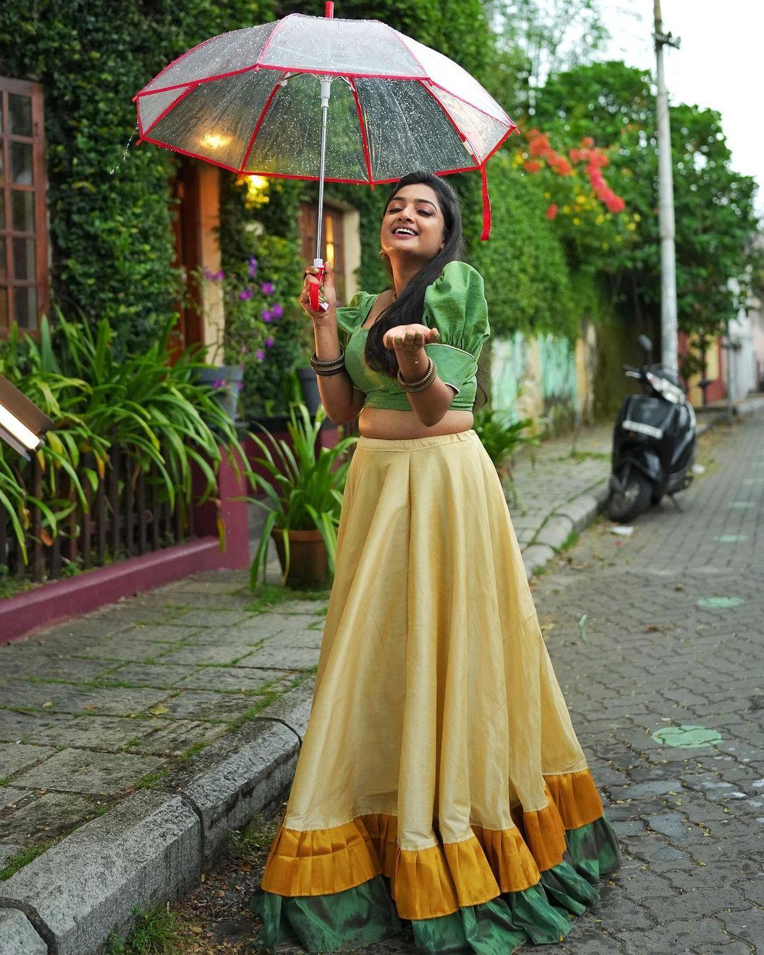 Cute and sexy stills | Nayana Prasad in pavada and blouse very cute and sexy stills