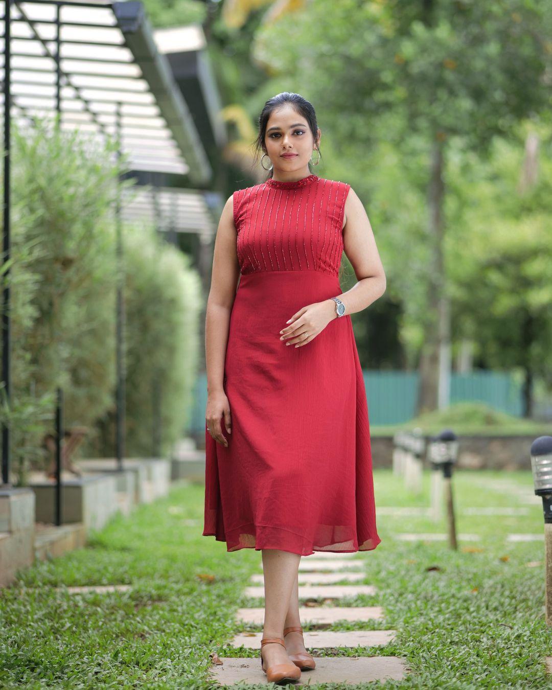 Exposing hot photos gallery | Rebecca Santhosh looking very attractive and cute stills in Red dress