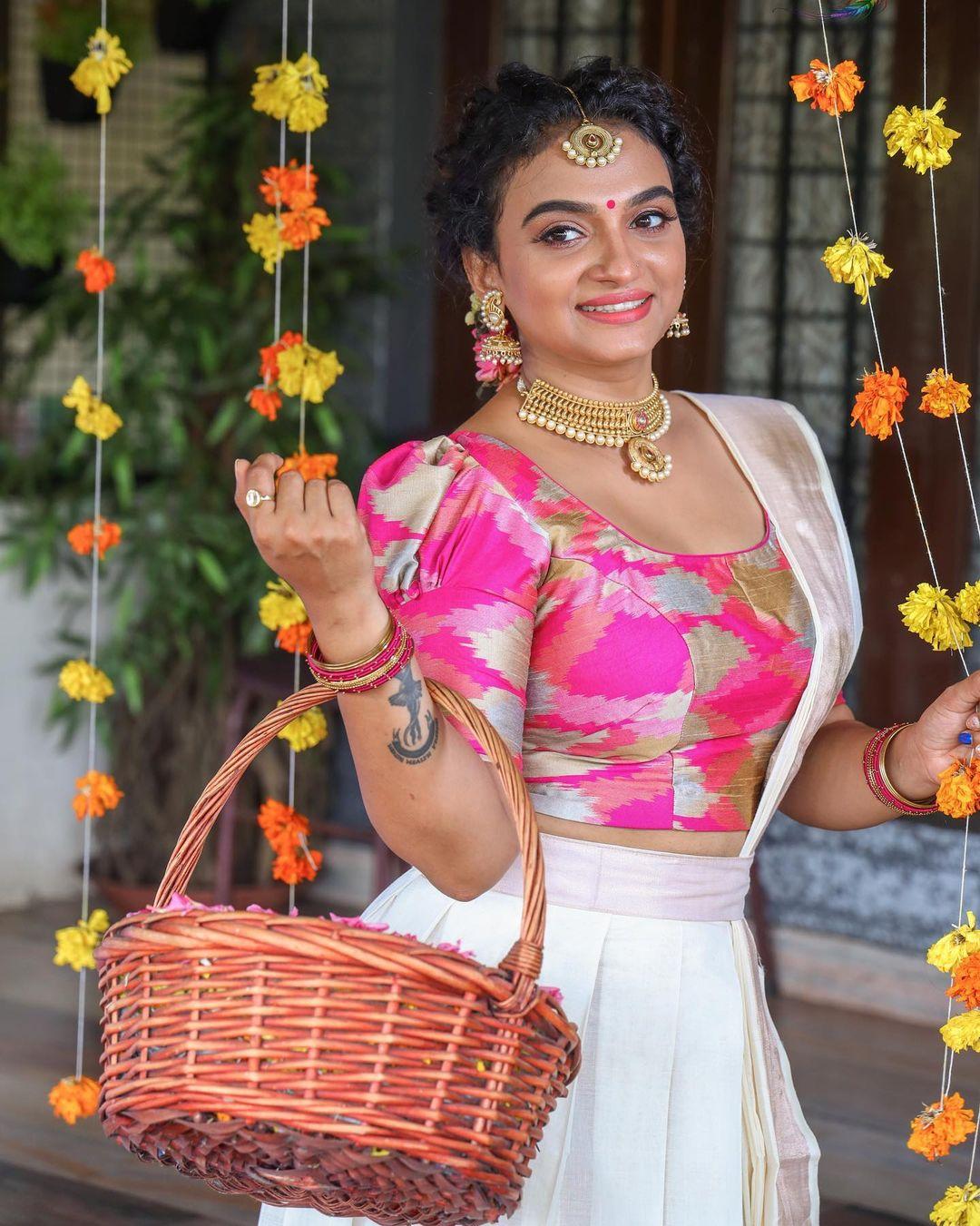 Glamorous and cute stills | Krishna Prabha onam special hot and sexy photos in pavada and blouse