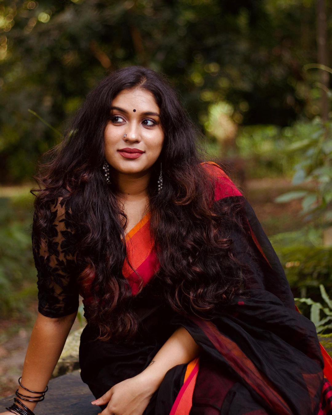 Beautiful and sexy photoshoot | Radhika radhakrishnan in red saree glamorous photos