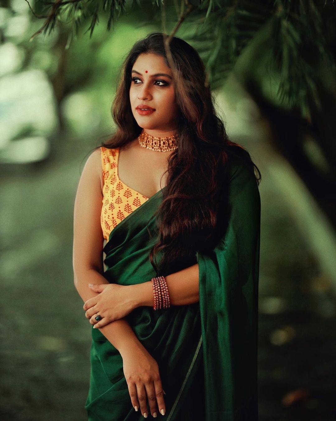 Exclusive hot photos gallery | Radhika radhakrishnan in sleeveless blouse and saree hot photos gallery