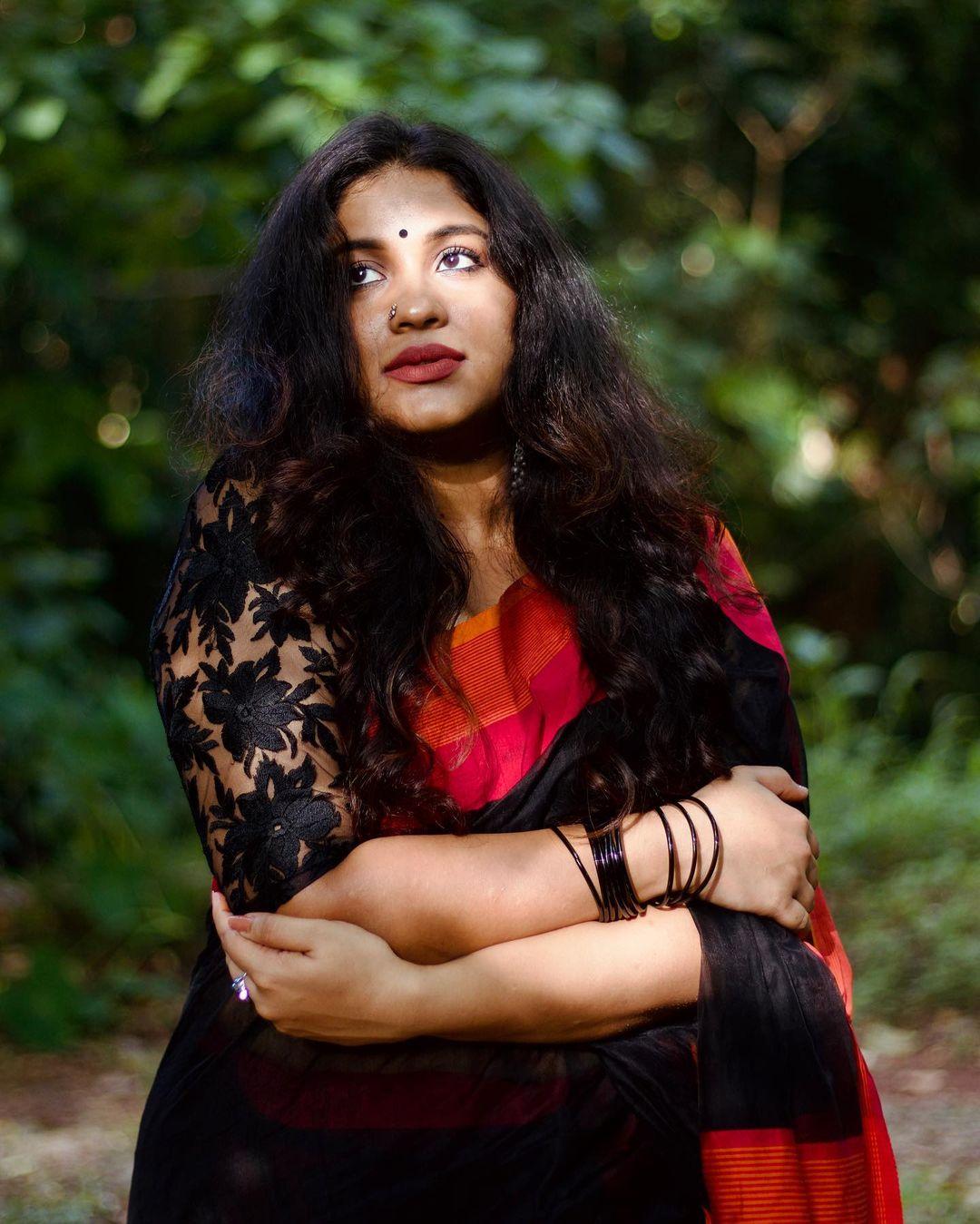 Exposing hot photos gallery | Radhika radhakrishnan in red saree glamorous photos