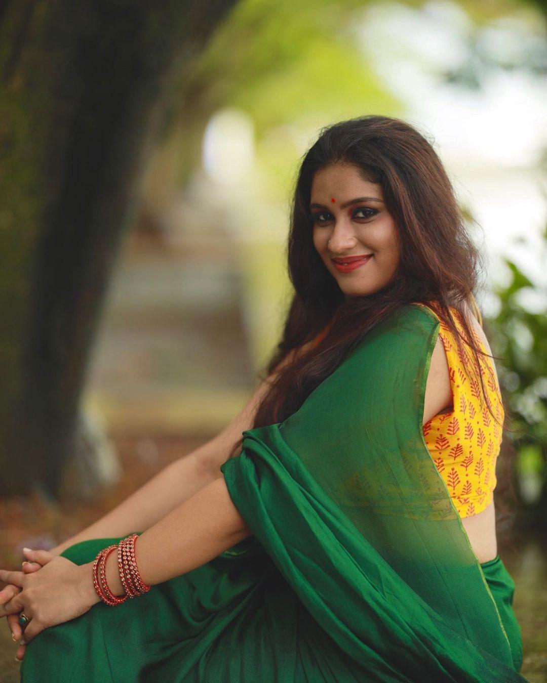 Latest hot and sexy photoshoot | Radhika radhakrishnan in sleeveless blouse and saree hot photos gallery