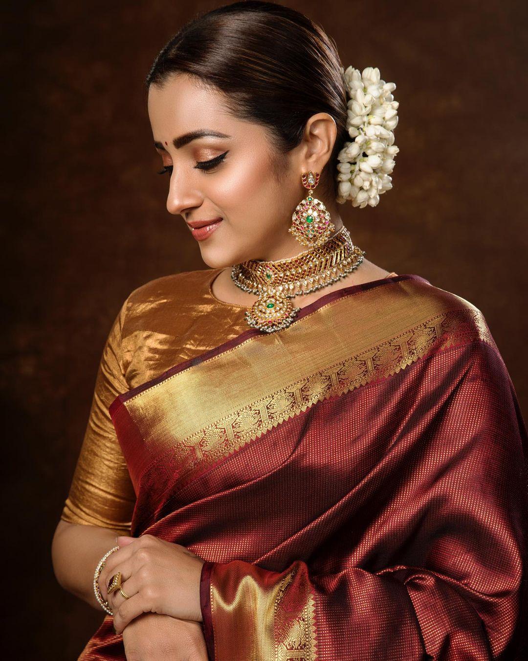 Exclusive very hot photos | Trisha Krishnan looking very hot in bridal makeup photos