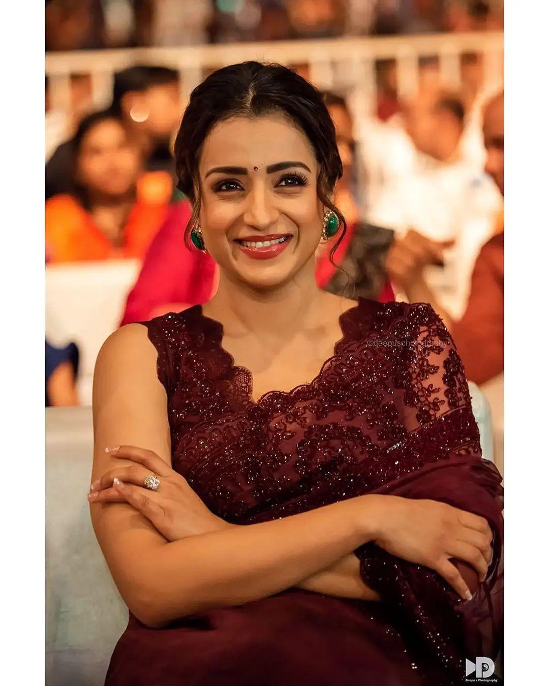 Glamorous and cute stills | Trisha Krishnan beautiful and sexy photoshoot in red transparent saree