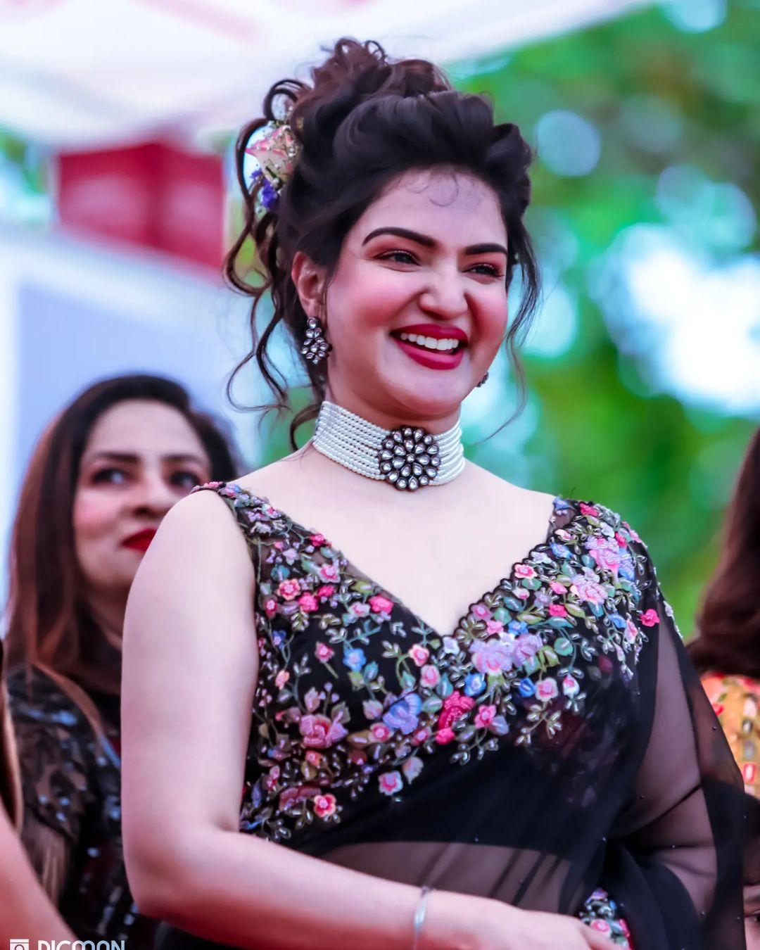 Glamorous and cute stills | Honey Rose very exclusive hot and sexy photos in black Transparent saree