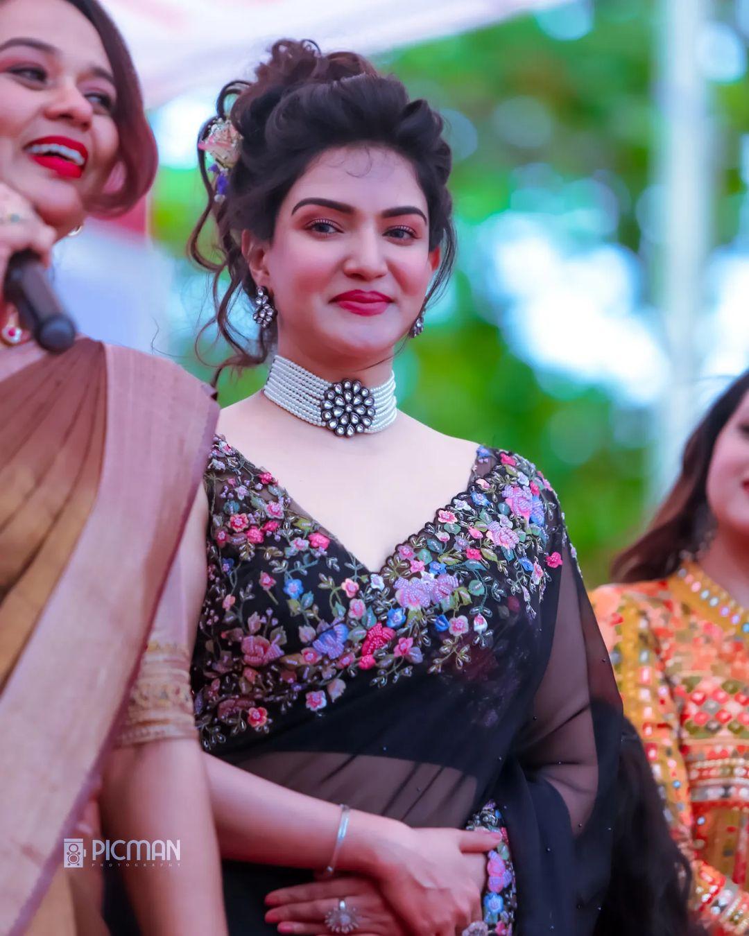 Looking very attractive hot stills | Honey Rose very exclusive hot and sexy photos in black Transparent saree