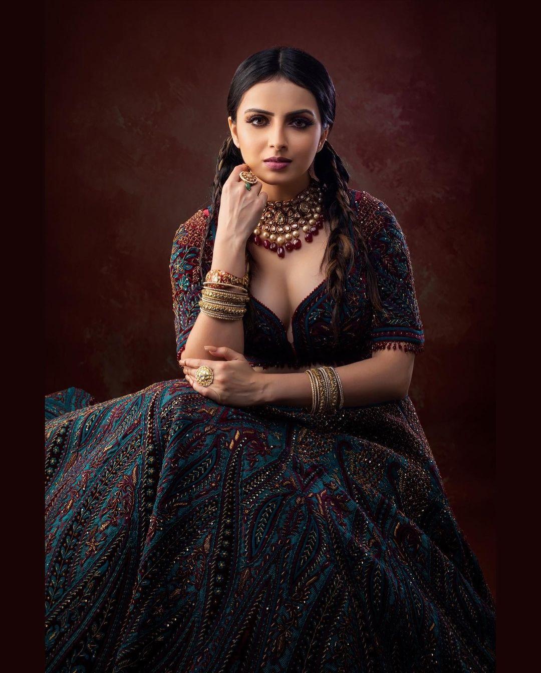Cleavage hot photos gallery | Shrenu Parikh in bridal makeup hot and sexy photoshoot