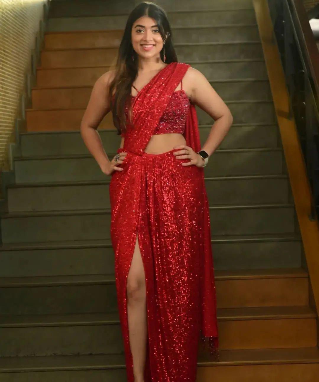 Exposing very hot photos gallery | Madhuri Braganza in red saree glamorous and sexy photoshoot