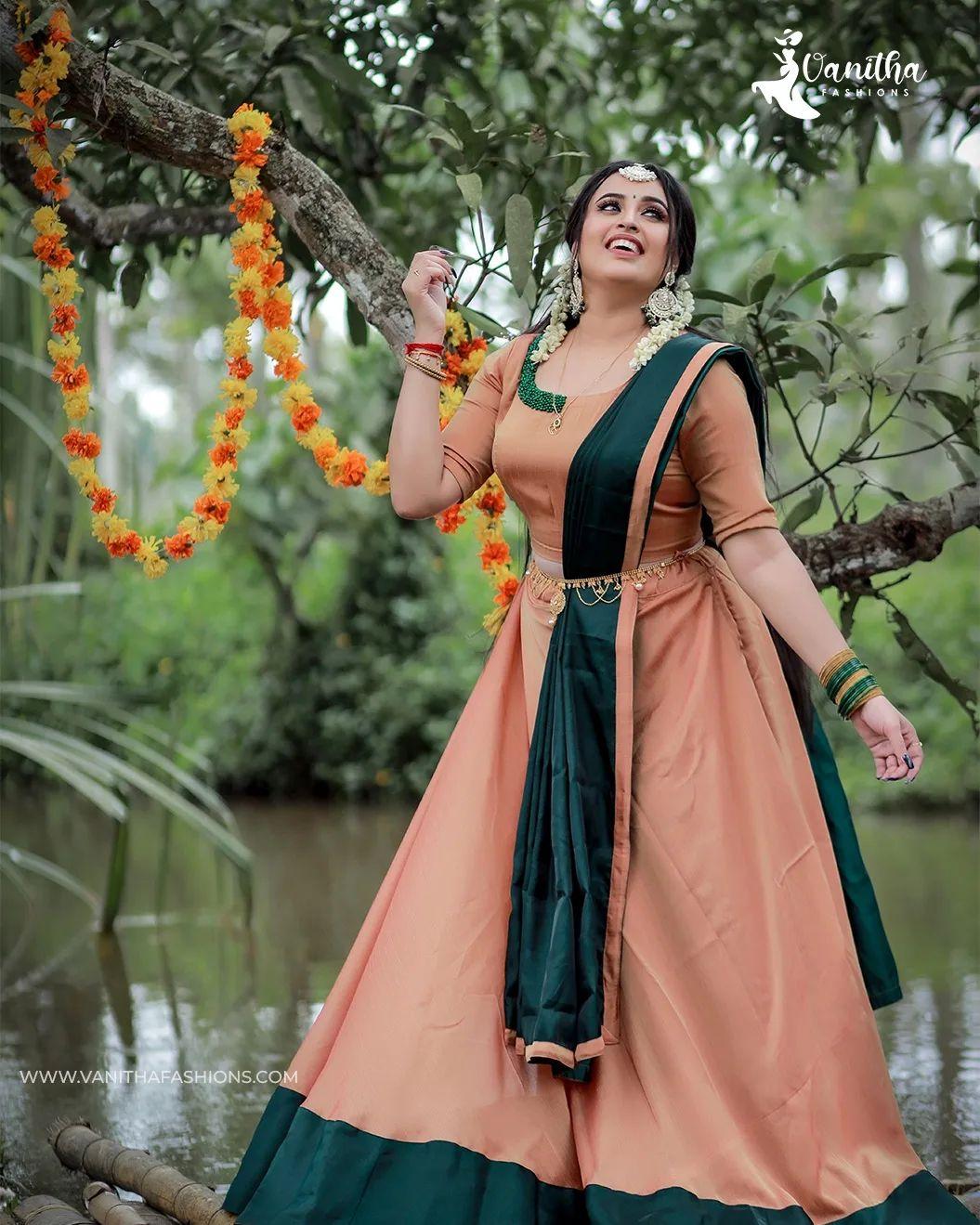 Cute and spicy photos gallery | Aiswarya Rajeev Onam special hot and sexy photos in Pavada and blouse