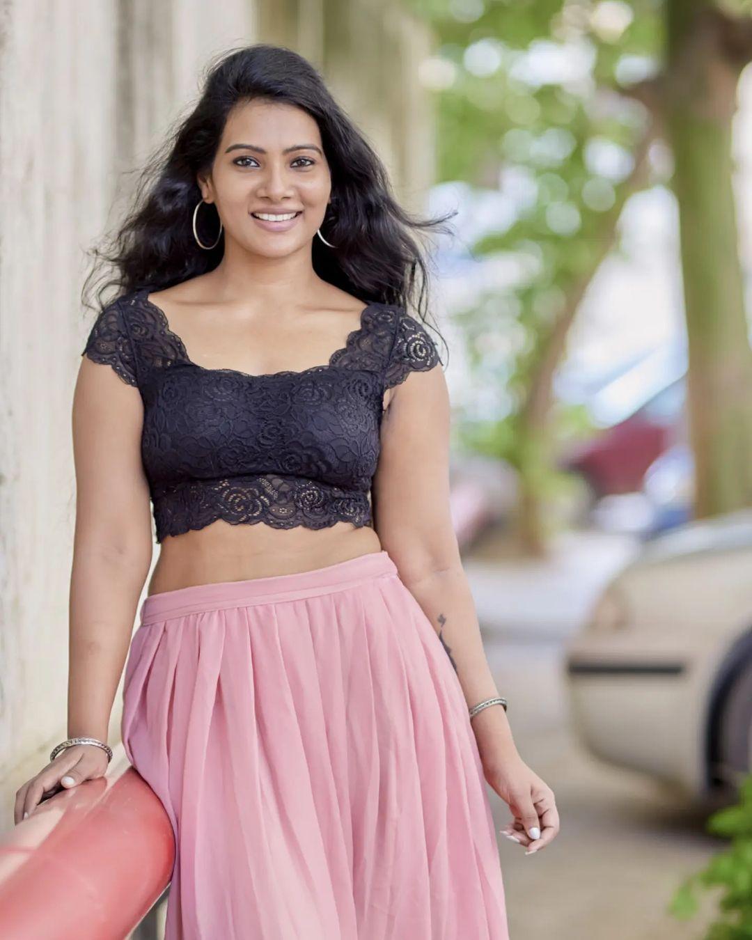 Glamorous and cute stills | Dhivya Dhuraisamy in looking very glamorous photos in pavada and blouse