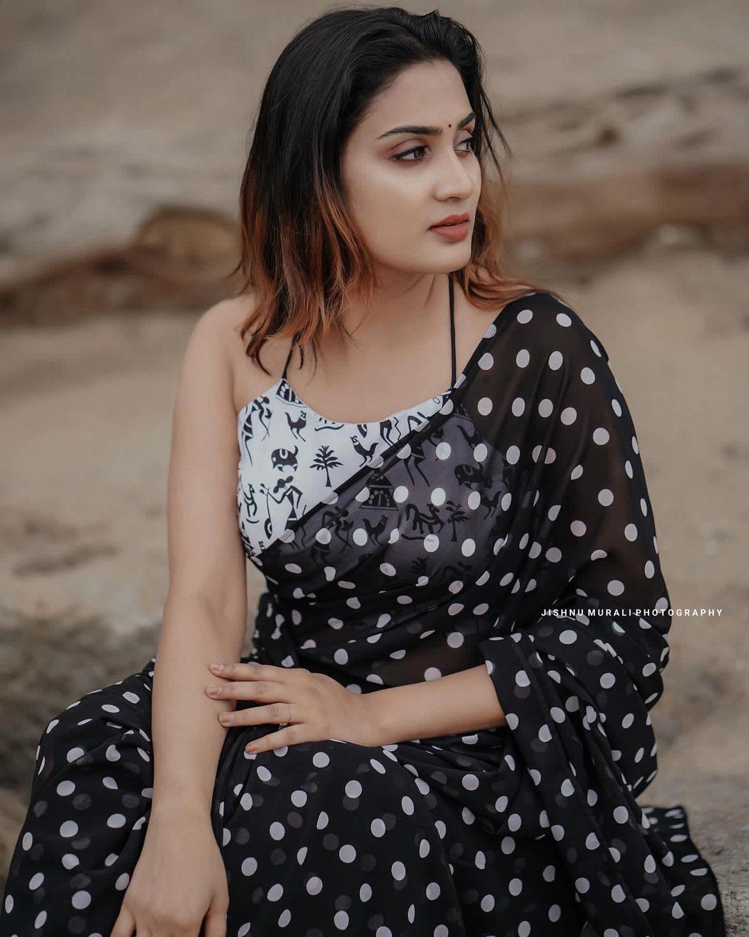 Beautiful and cute stills | Aditi Ravi wearing backless blouse and sexy photoshoot