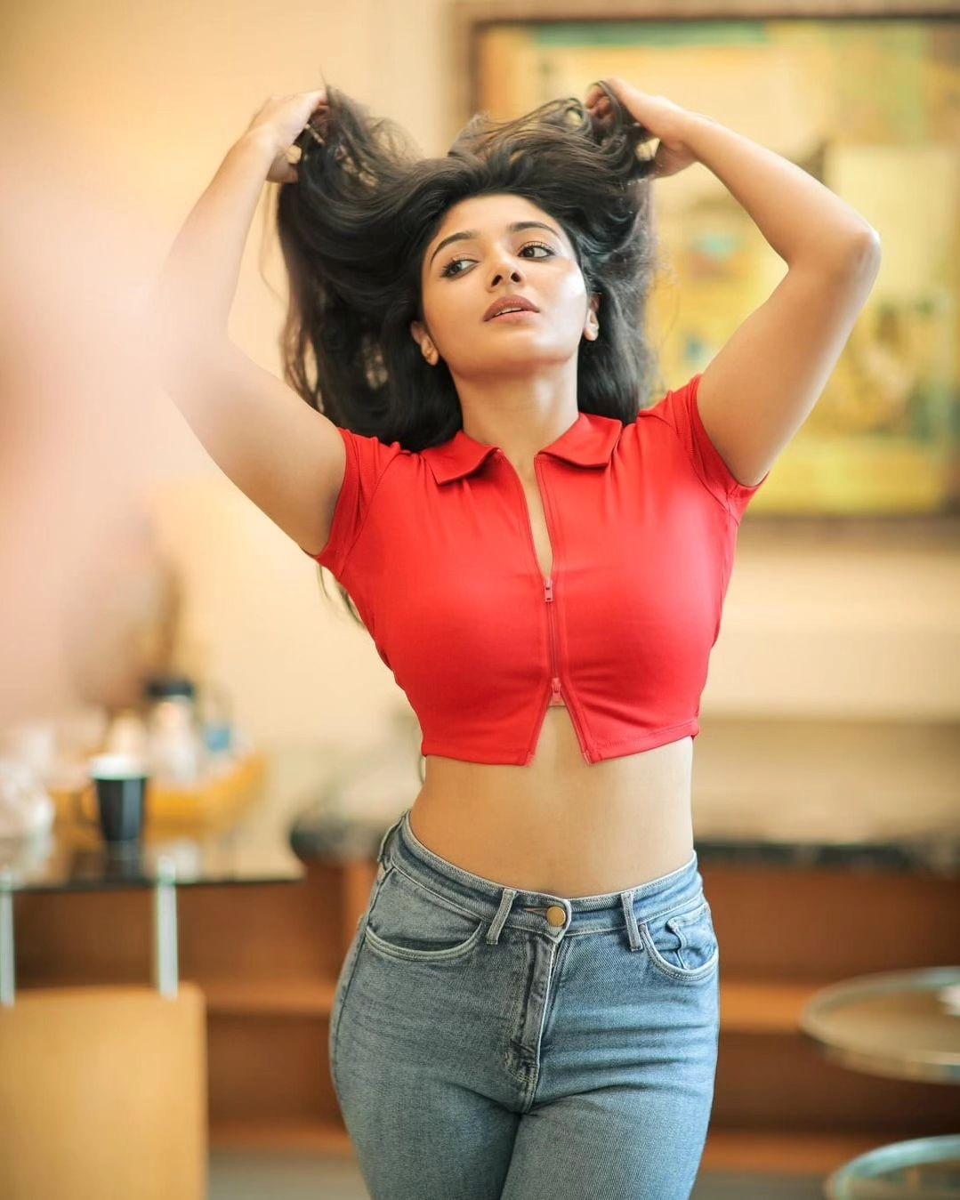 Mirna Menon exclusive hot photos in red top