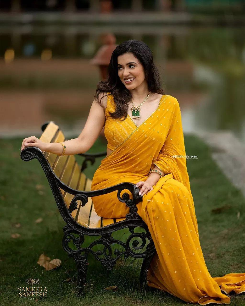 Anju Kurian in yellow saree exclusive and cute stills