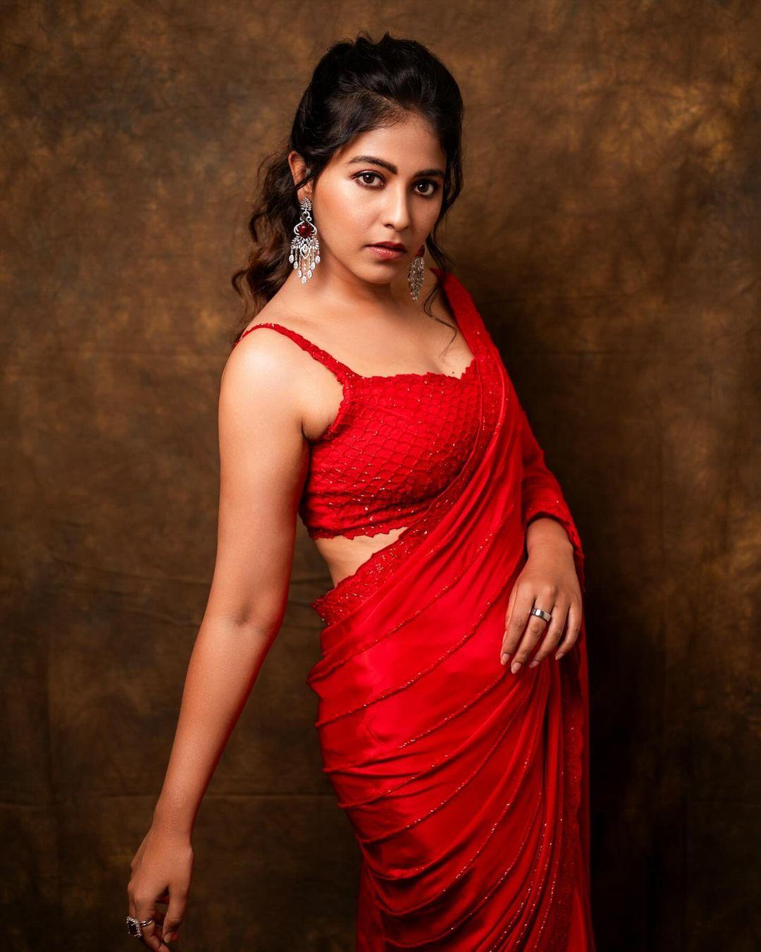 Tamil actress Anjali in red saree hot photos gallery