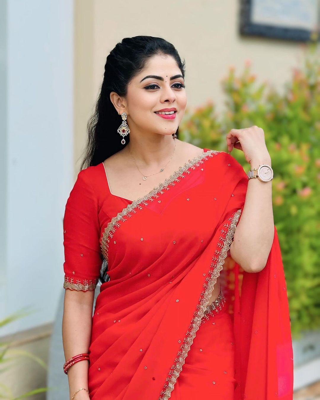 Glamorous photos | Sharmitha Gowda in red saree hot photos gallery